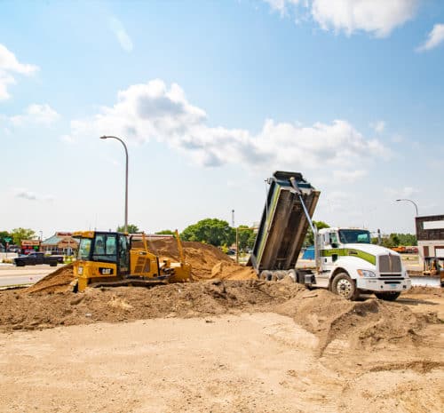 Site development on a commercial parking lot project.