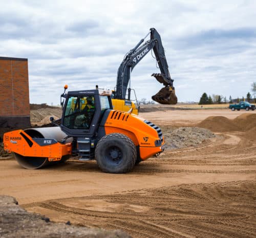 HAMM H12i smooth drum compactor on site development project.