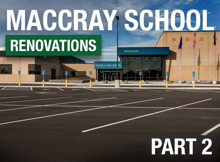 Newly paved parking lot with MACCRAY school in the background