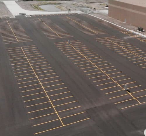 Drone shot of completed parking lot with parking spots