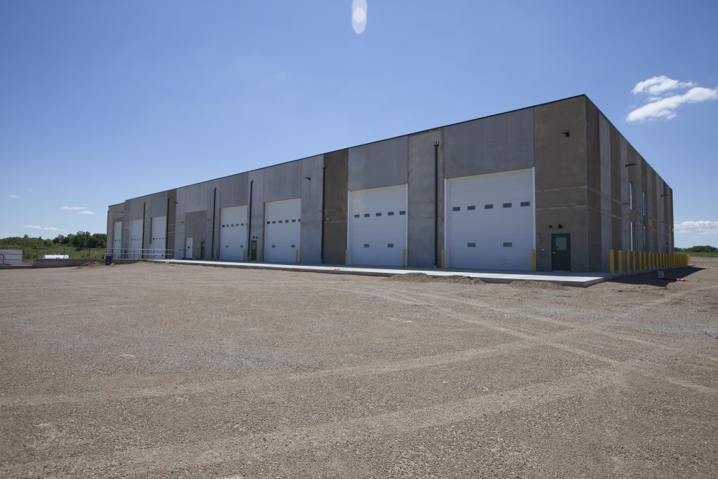 Large industrial warehouse building with loading docks